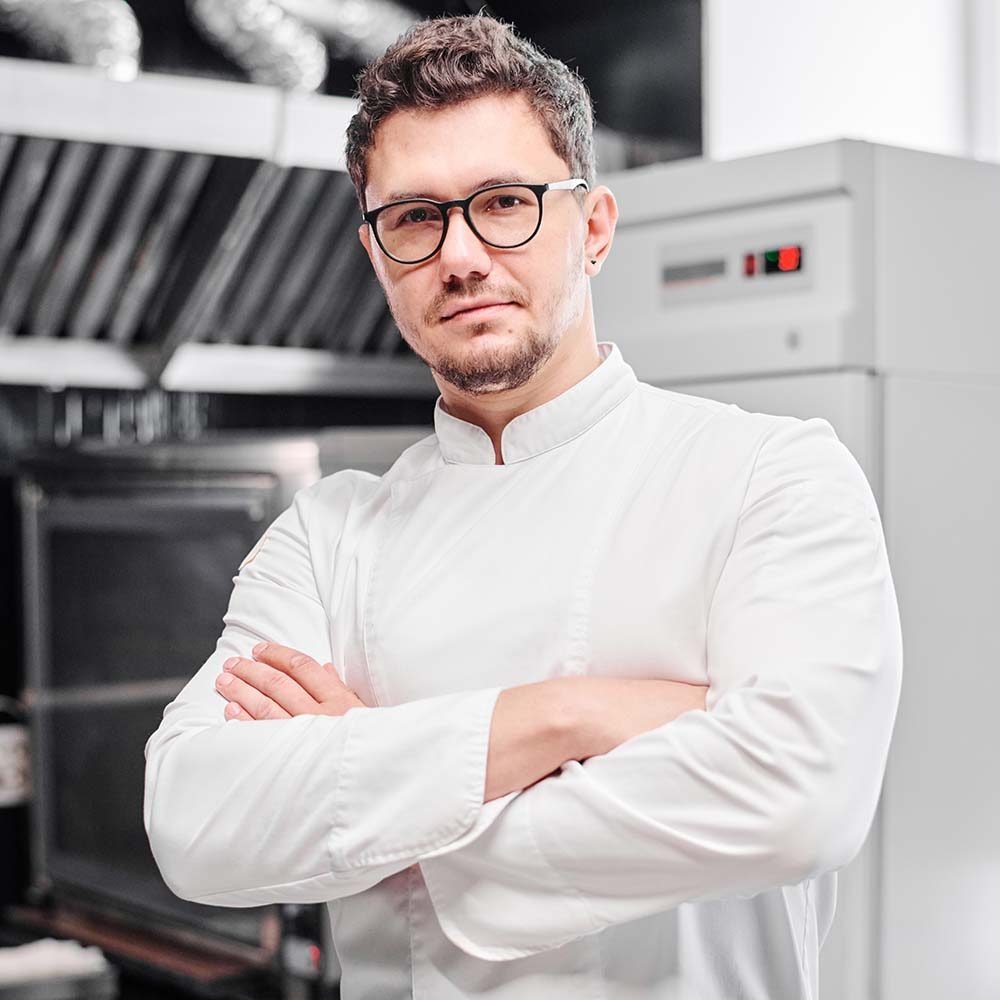 young-professional-chef-in-kitchen-HF8SK2Y.jpg